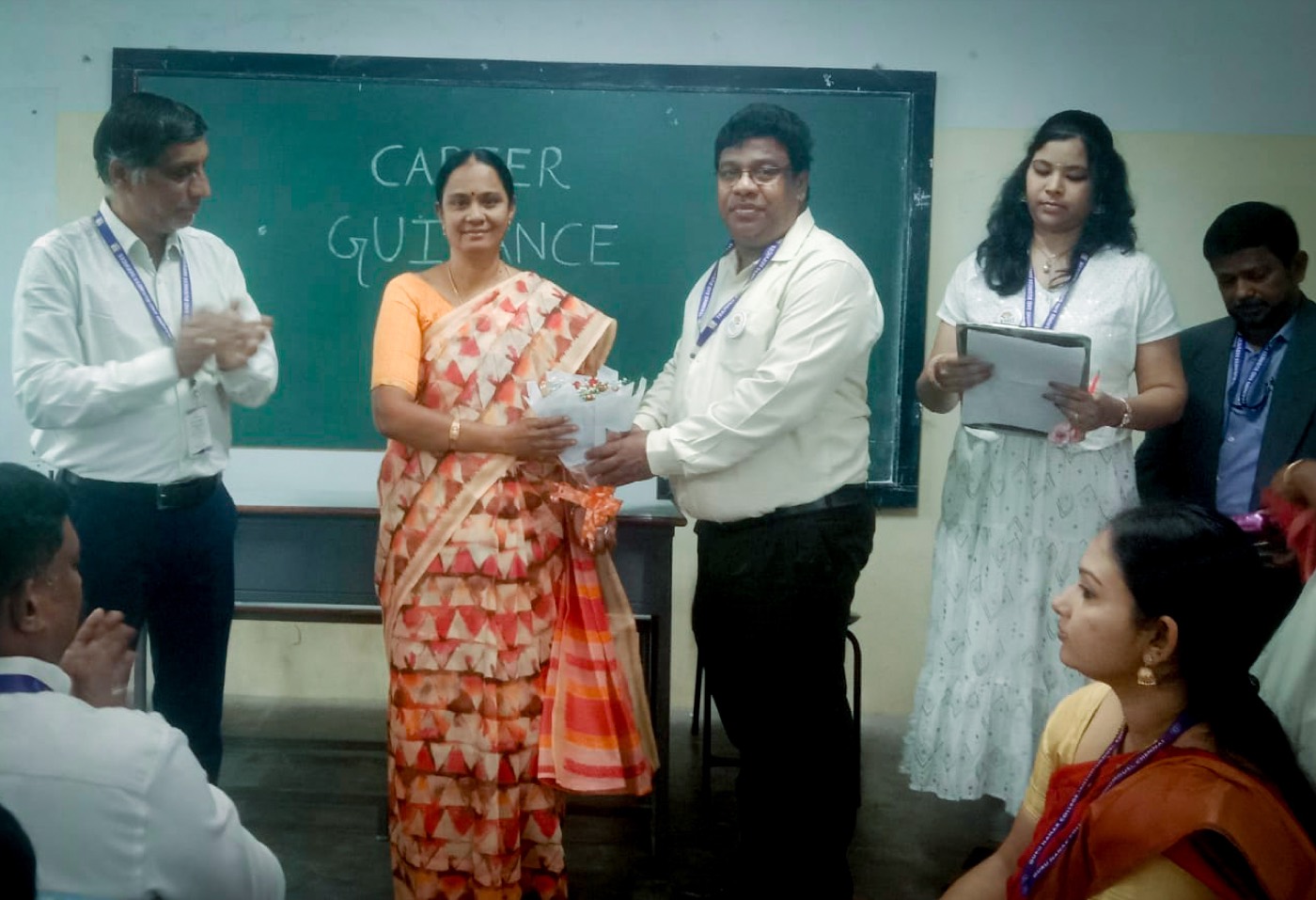 A memento being presented at Guru Nanak College
