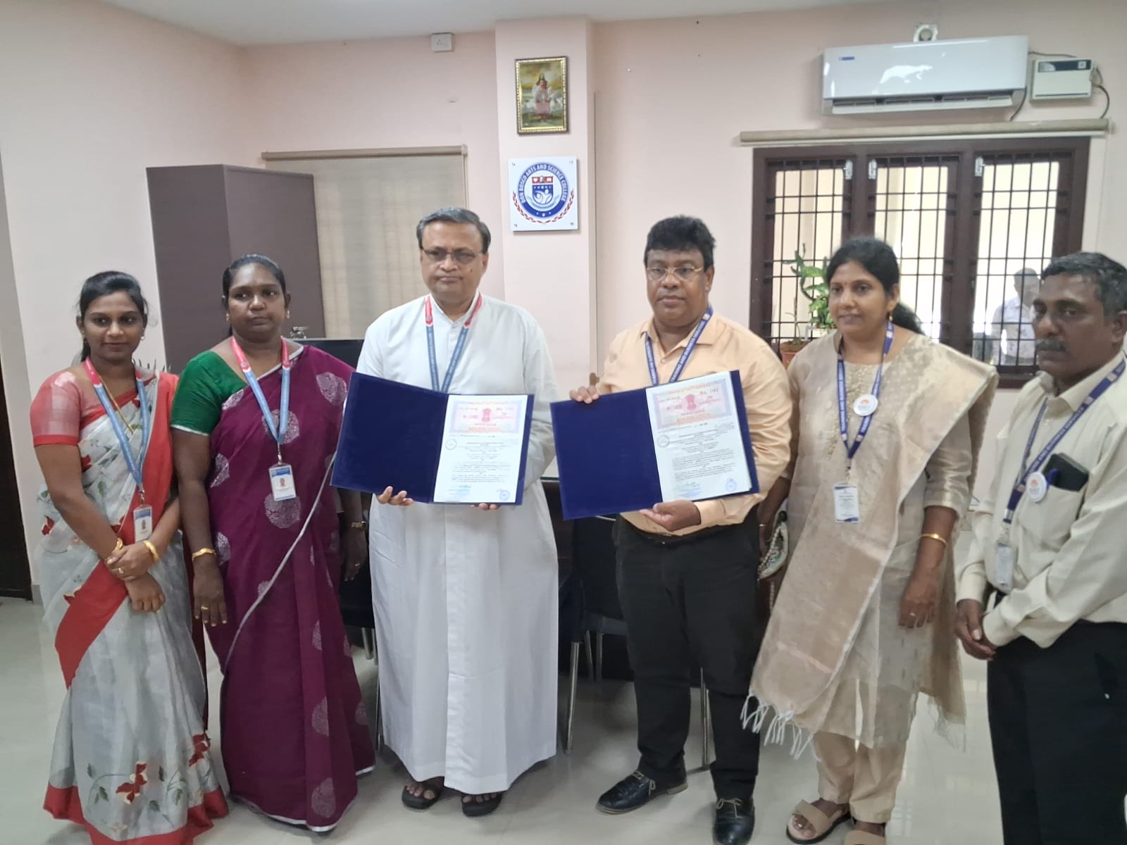 BMIT and college representatives with the signed memorandum of understanding